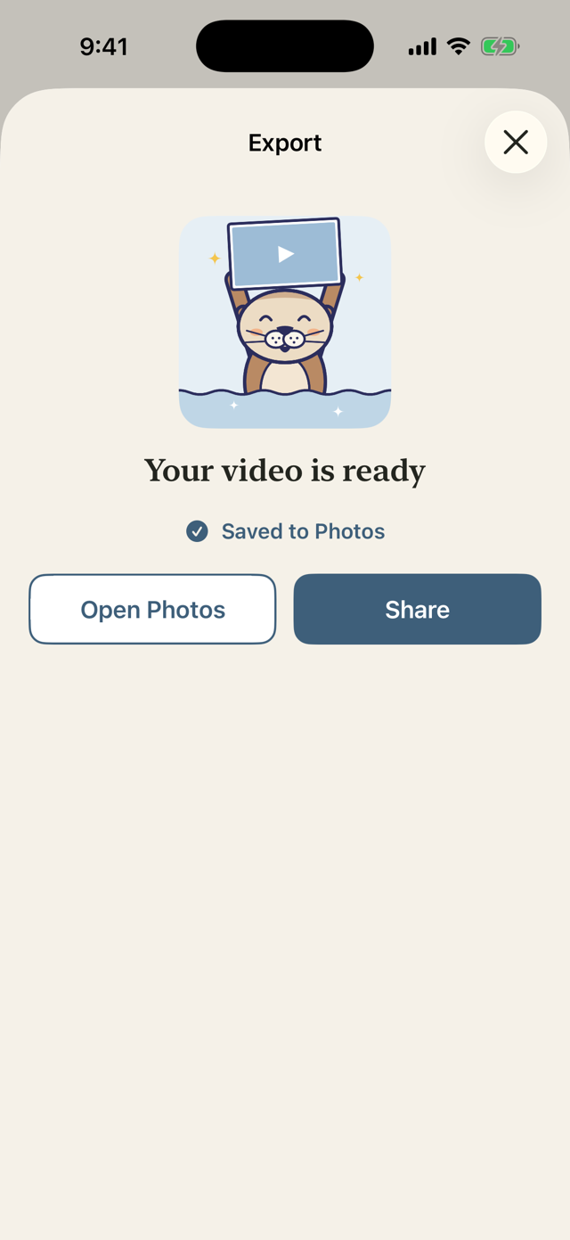 The finished export in Humble Video: Otis holding up a video, “Your video is ready,” Saved to Photos, and buttons for Open Photos and Share
